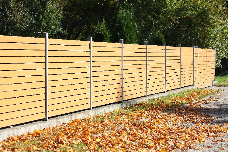 Wooden fence in the coutryside in autumn